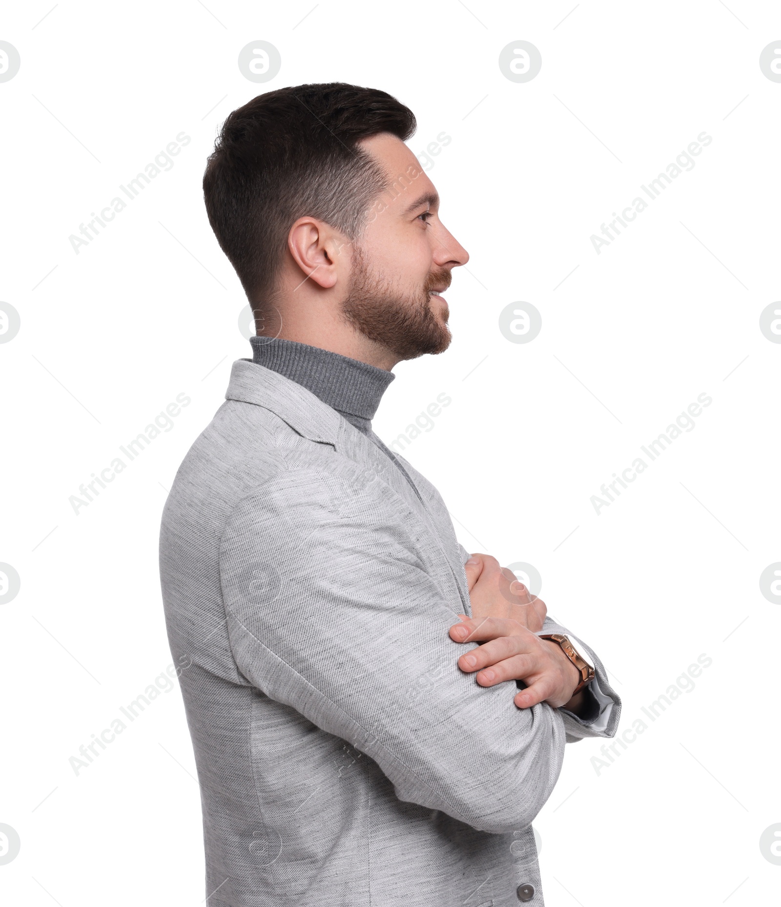 Photo of Handsome bearded businessman in suit on white background