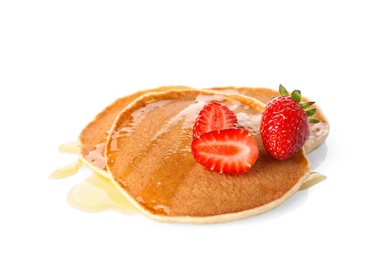 Photo of Tasty pancakes with maple syrup and fresh berries on white background