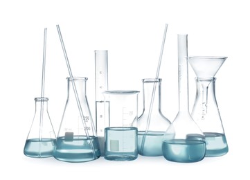 Photo of Laboratory glassware with liquid isolated on white