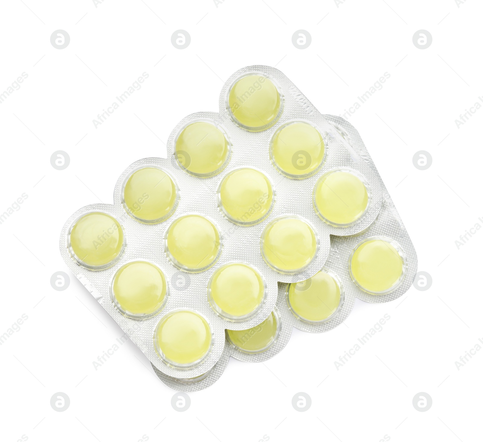 Photo of Blisters with yellow cough drops on white background, top view