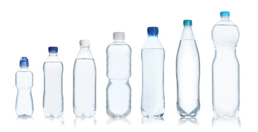 Set with different bottles of pure water on white background. Banner design