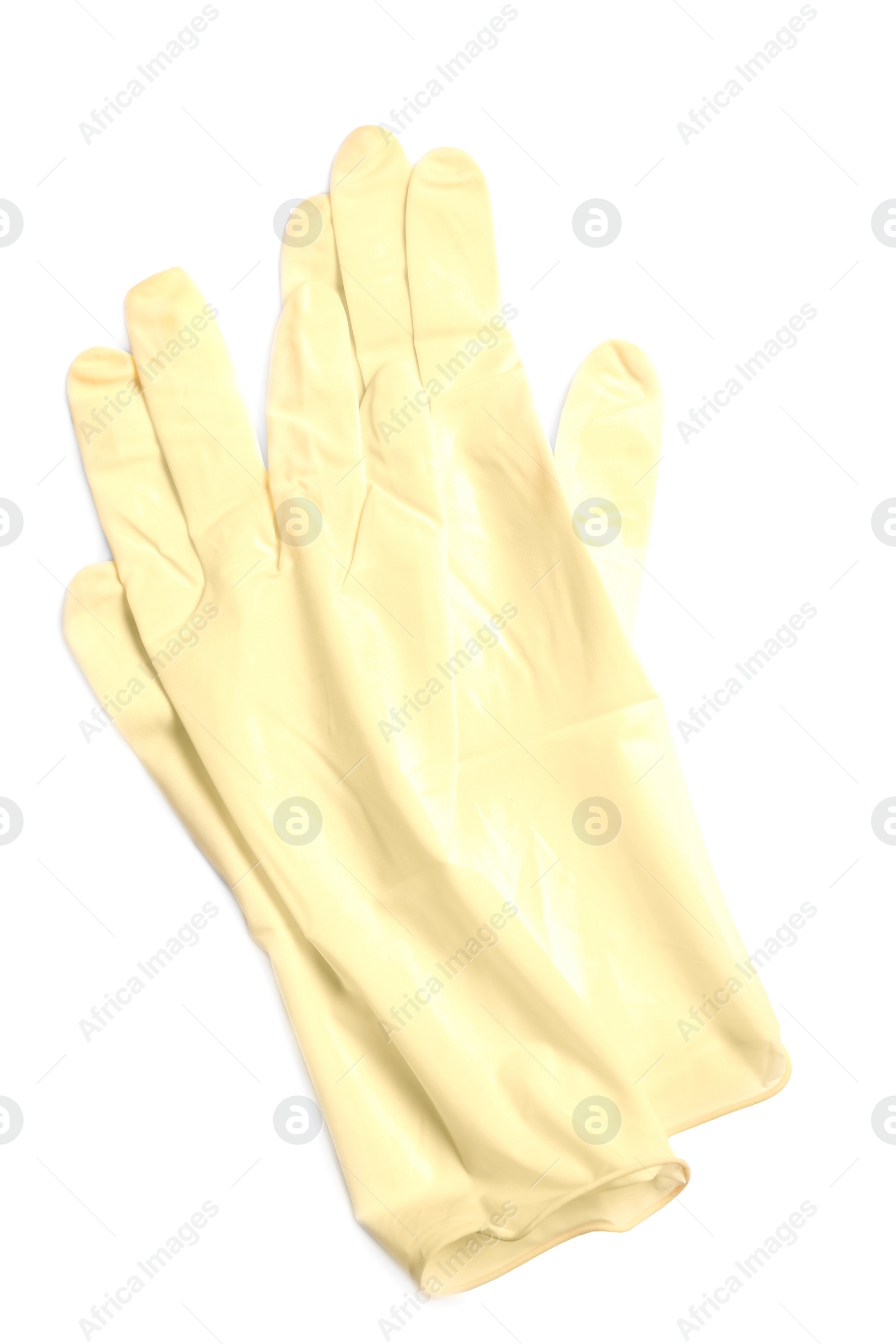 Photo of Medical gloves on white background, top view