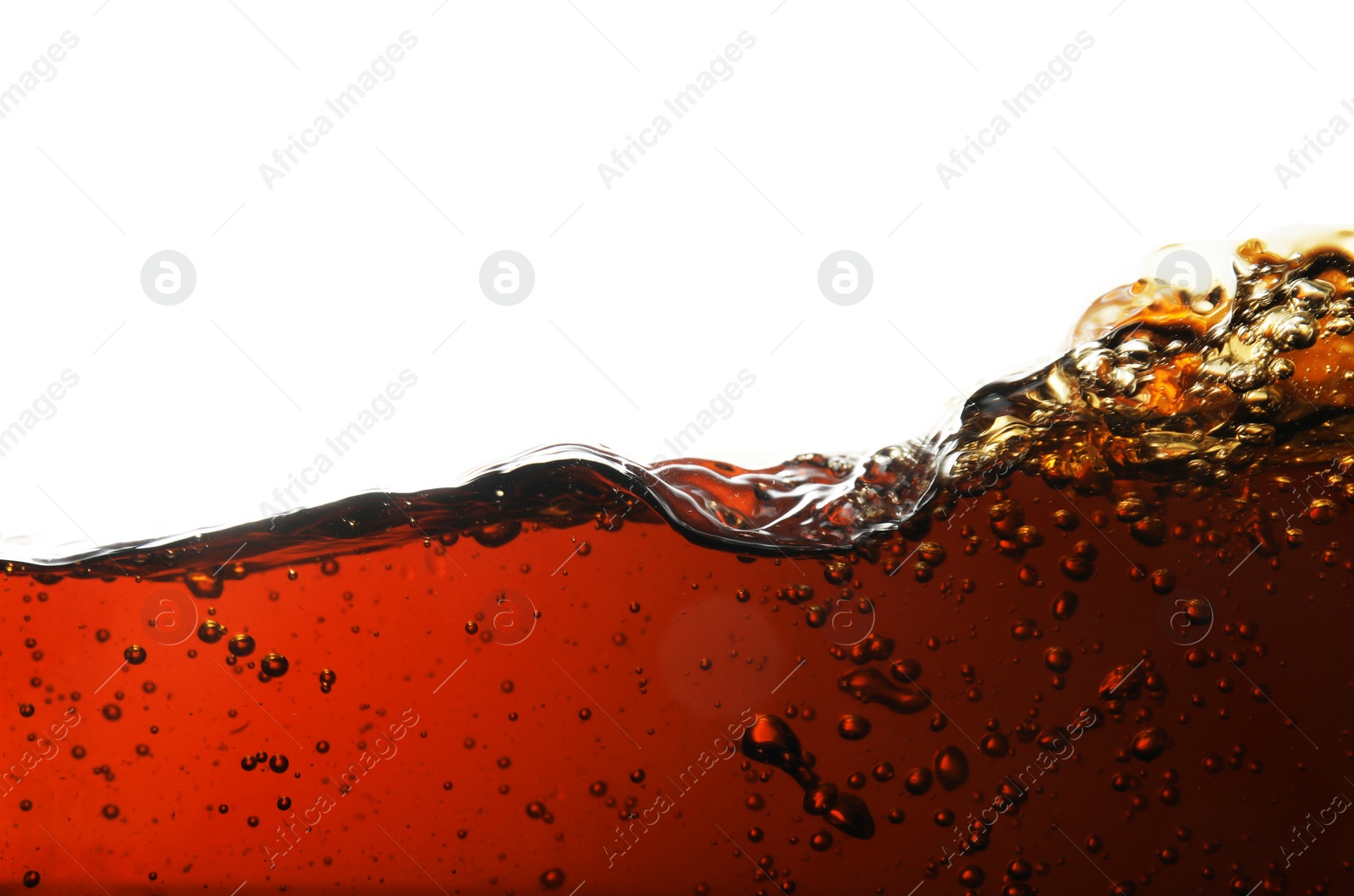 Photo of Closeup view of tasty refreshing cola on white background