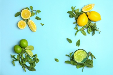 Photo of Flat lay composition with delicious natural lemonade on color background