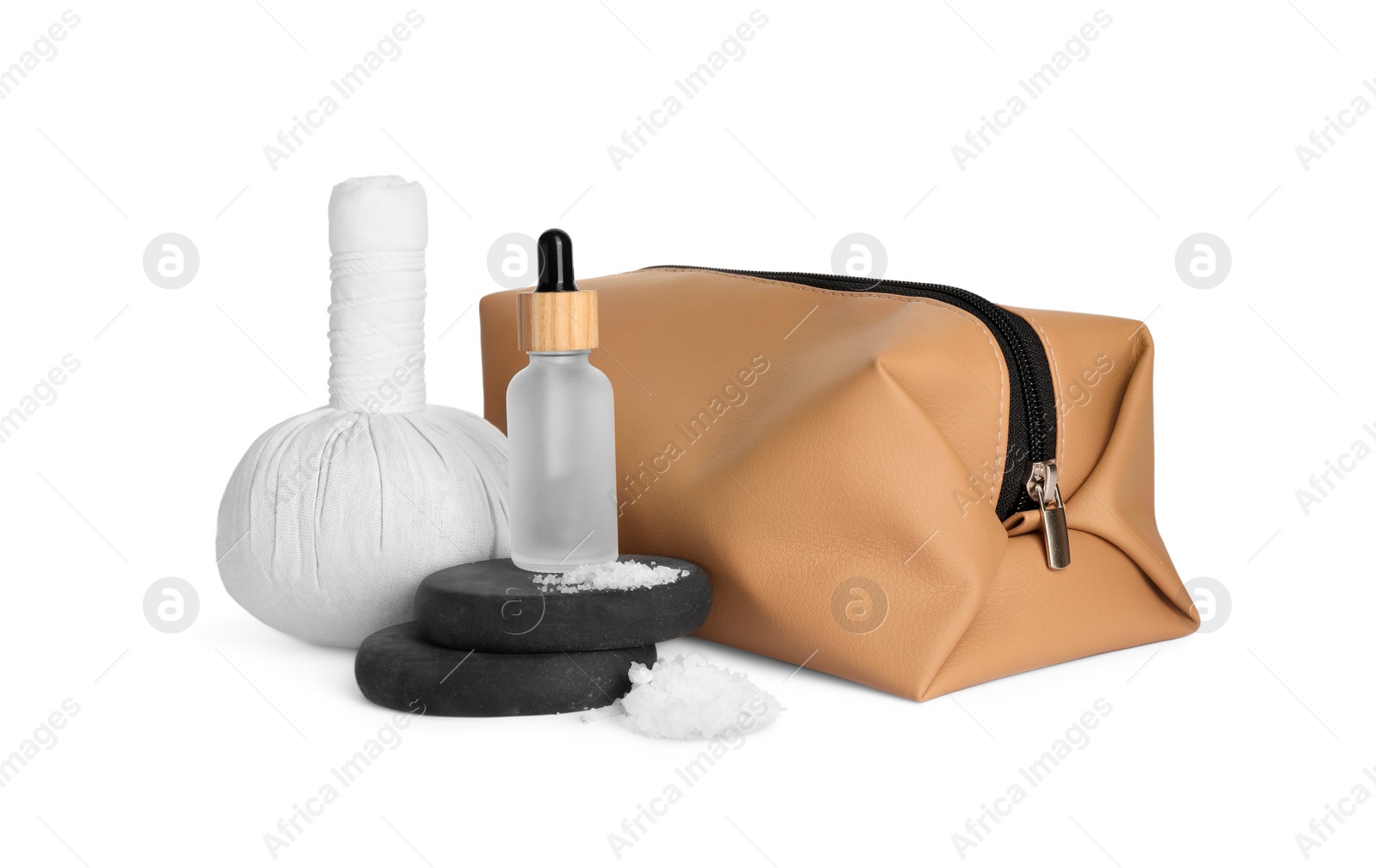 Photo of Compact toiletry bag, spa stones and different cosmetic products isolated on white