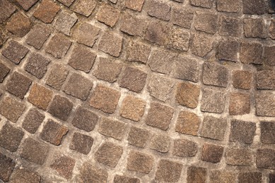 Photo of Texture of stone tiles as background, top view