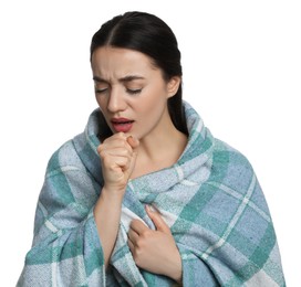 Photo of Young woman wrapped in blanket coughing on white background. Cold symptoms