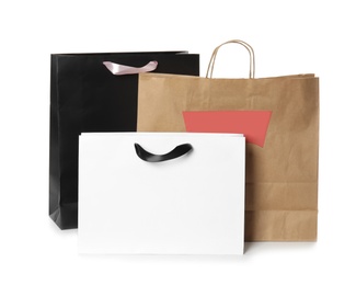 Photo of Paper shopping bags isolated on white. Mock up for design