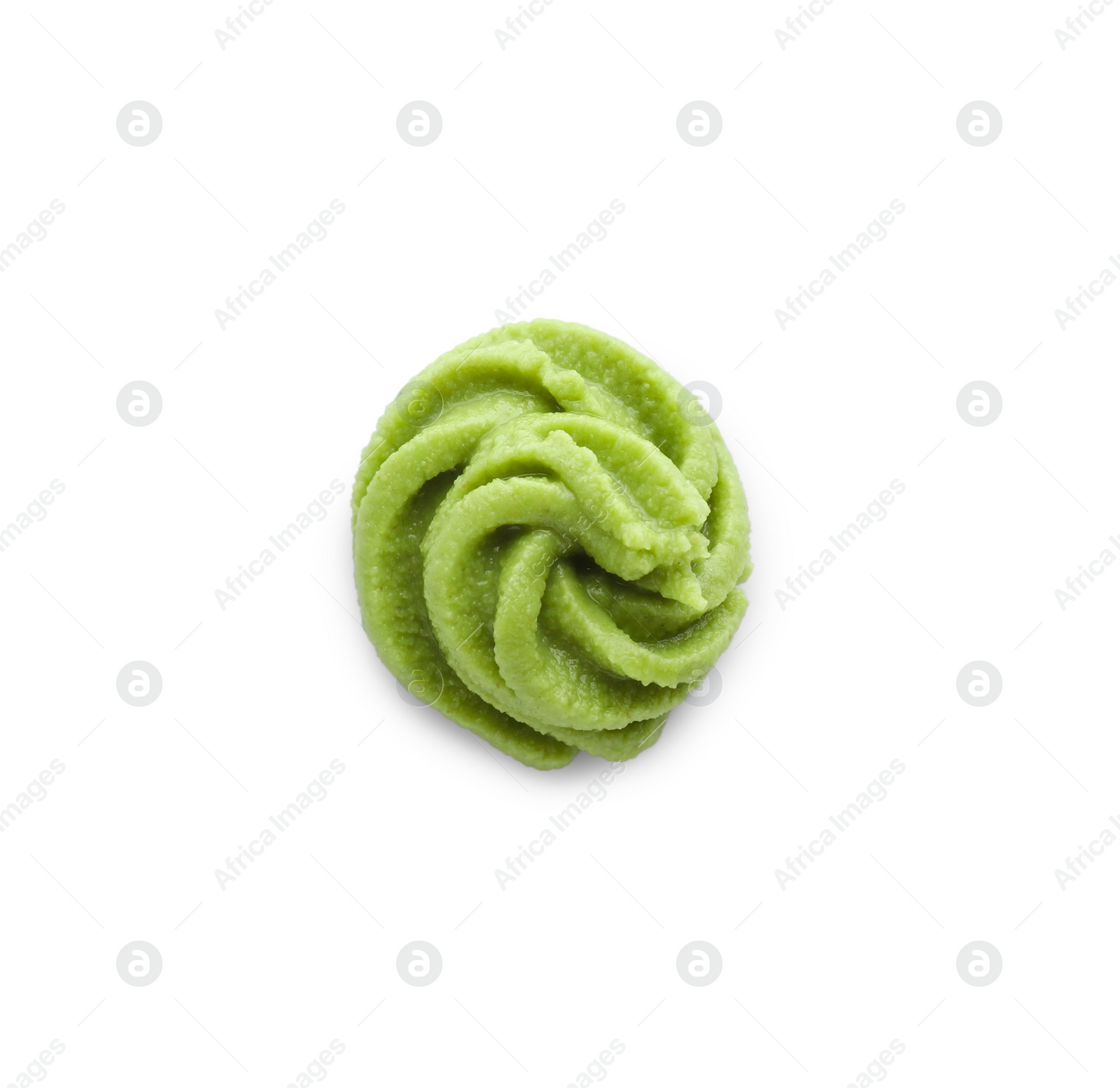 Photo of Swirl of delicious spicy wasabi paste isolated on white, top view