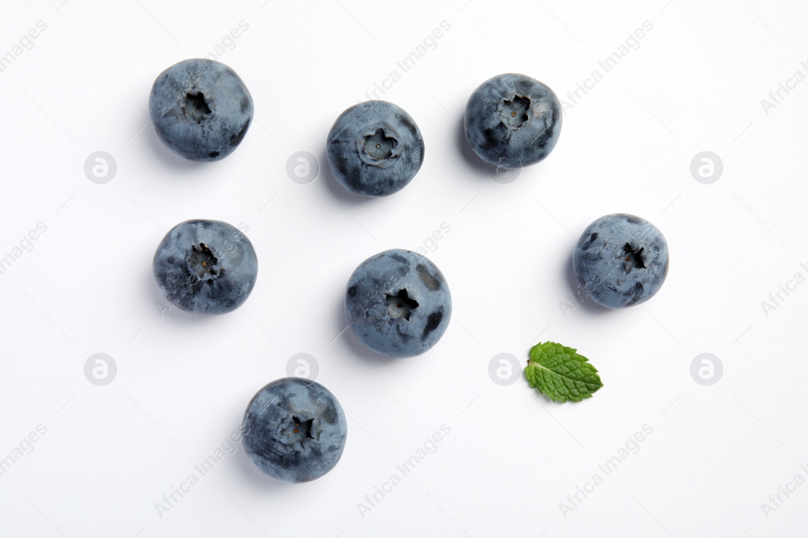 Photo of Flat lay composition with tasty blueberry on white background