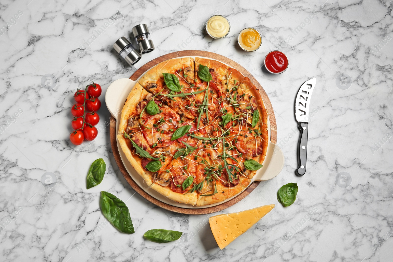 Photo of Flat lay composition with tasty homemade pizza on table