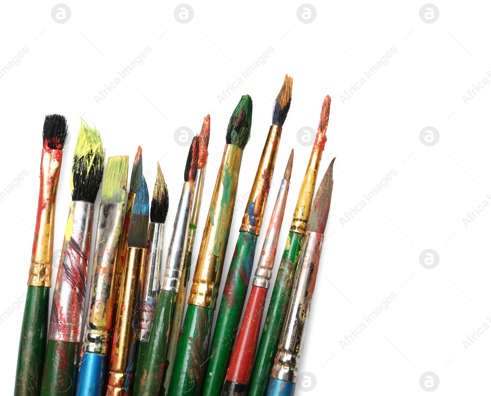 Photo of Different paint brushes on white background, top view