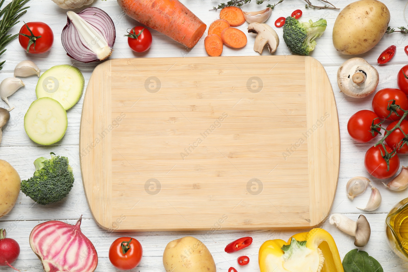 Photo of Flat lay composition with fresh products on white wooden table, space for text. Healthy cooking