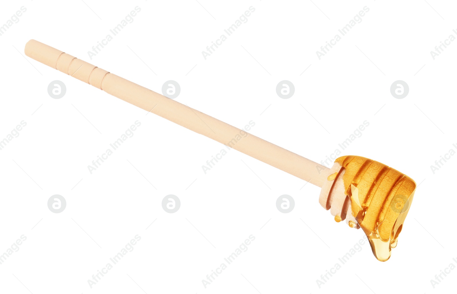 Photo of Natural honey dripping from dipper on white background