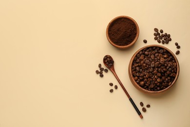 Ground coffee and roasted beans on beige background, flat lay. Space for text