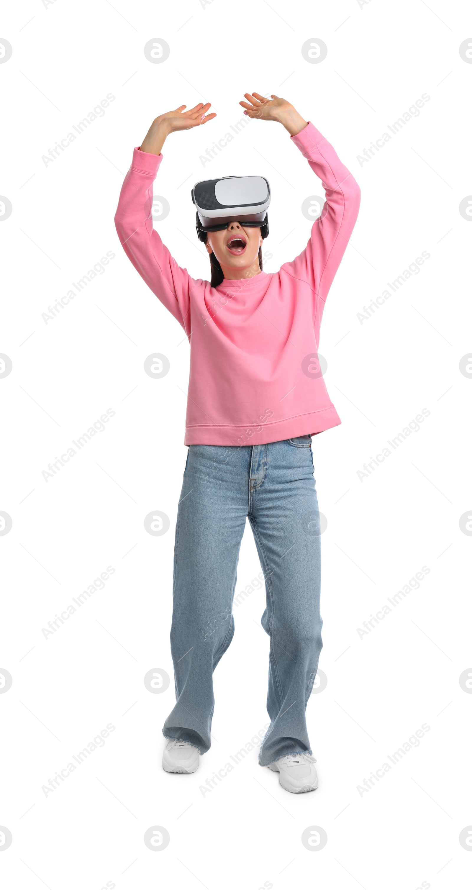 Photo of Woman using virtual reality headset on white background