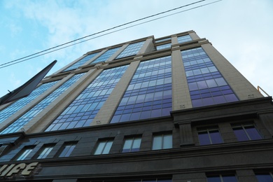 Photo of KYIV, UKRAINE - MAY 23, 2019: Modern business center SENATOR against sky with clouds