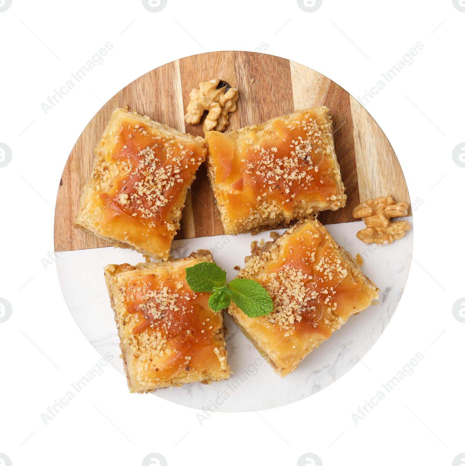 Photo of Eastern sweets. Pieces of tasty baklava isolated on white, top view