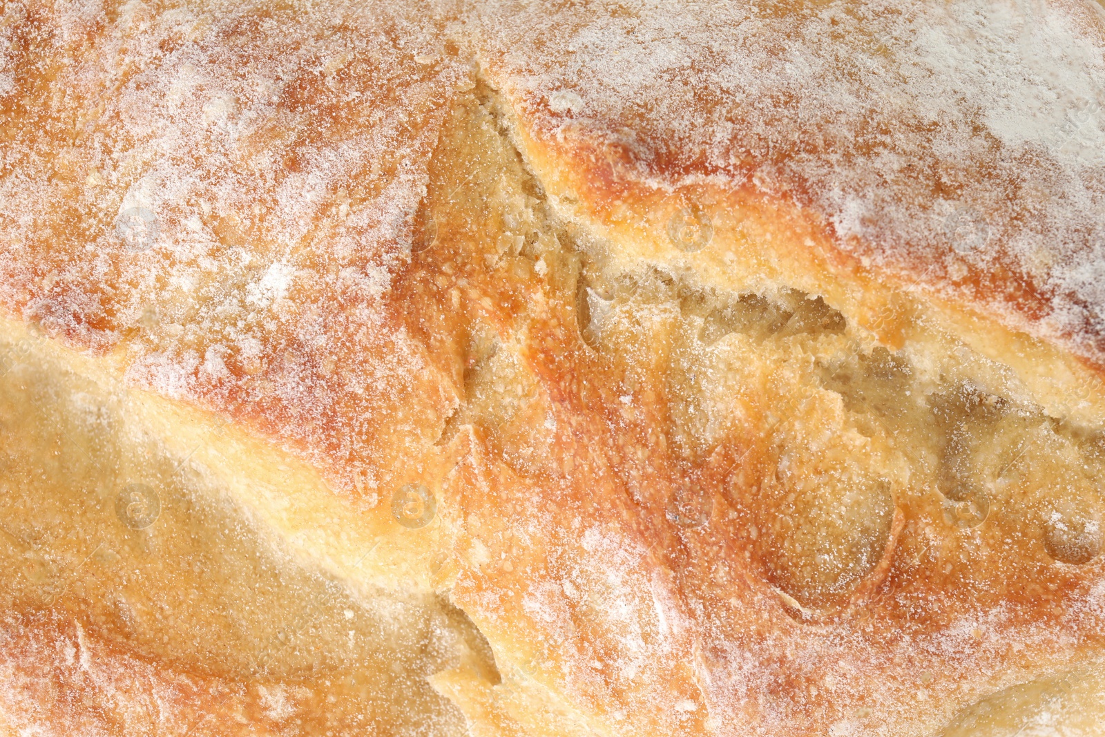 Photo of Closeup of tasty white bread as background, top view