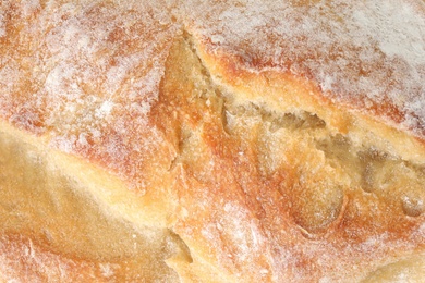 Photo of Closeup of tasty white bread as background, top view