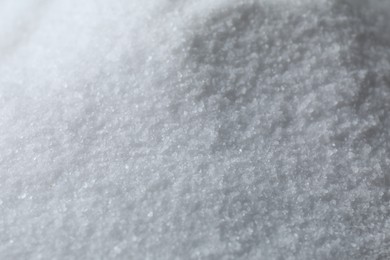 Photo of Organic white sea salt as background, closeup