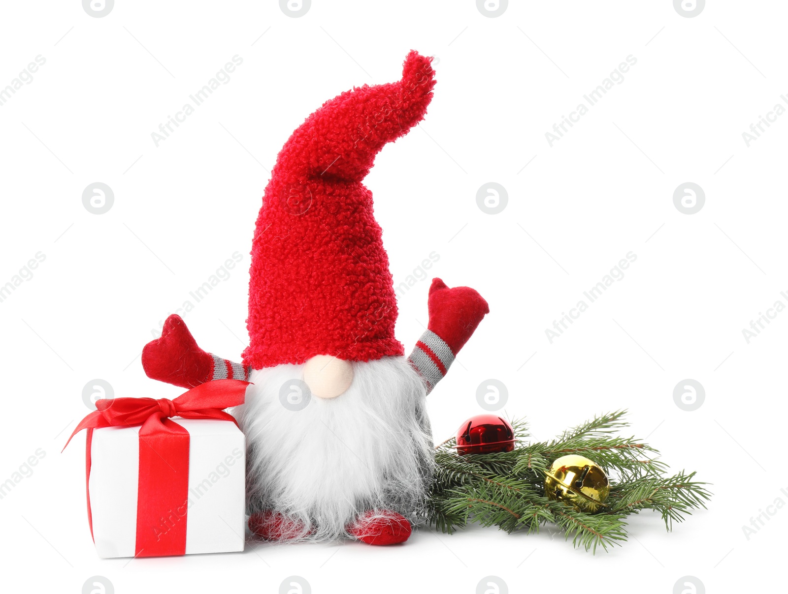 Photo of Funny Christmas gnome with gift box and festive decor on white background