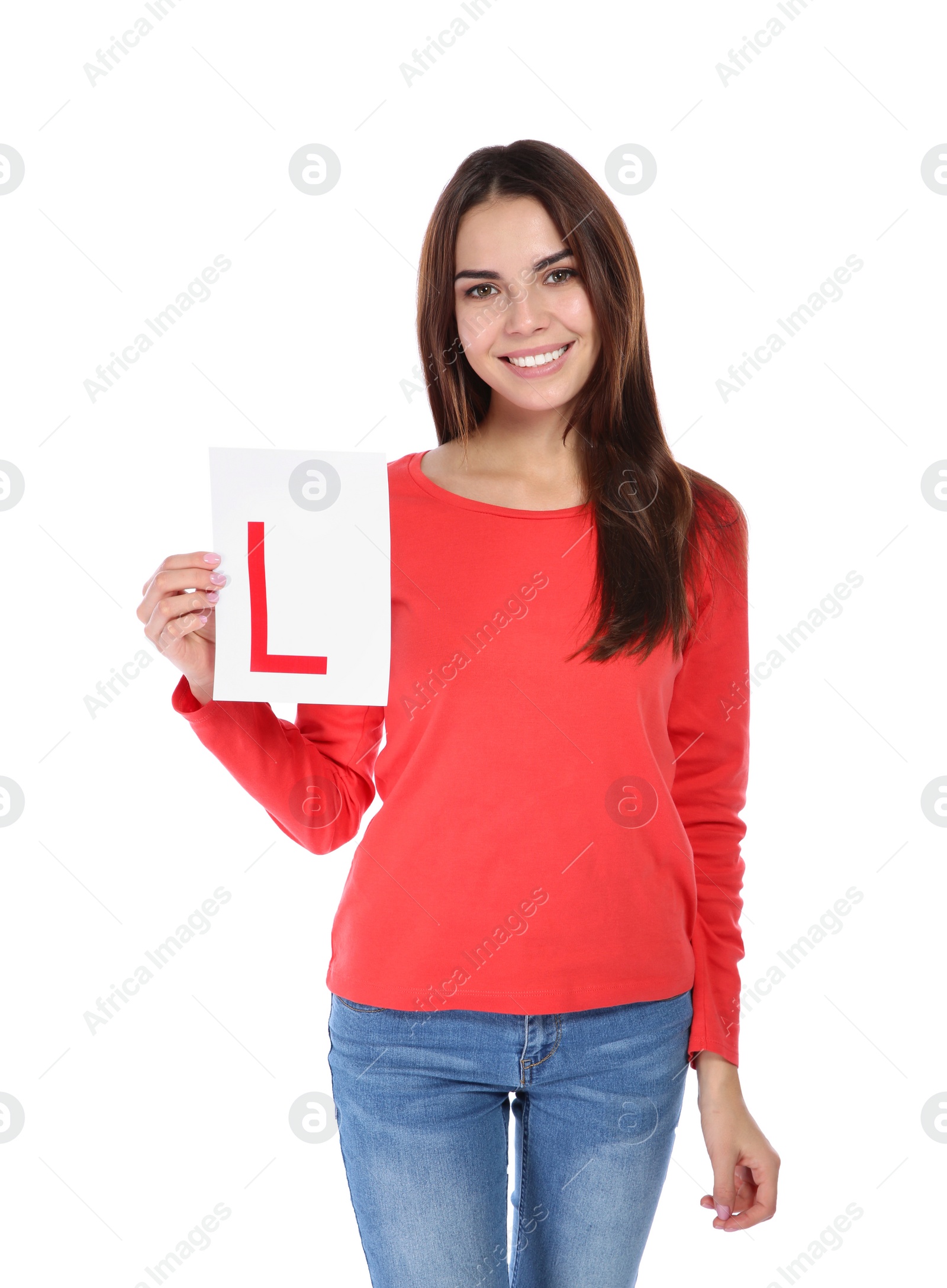 Photo of Young woman with L-plate on white background. Getting driving license