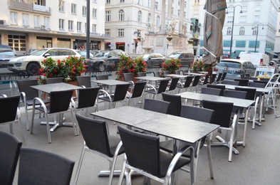 Photo of VIENNA, AUSTRIA - JUNE 18, 2018: Open-air cafe on city street