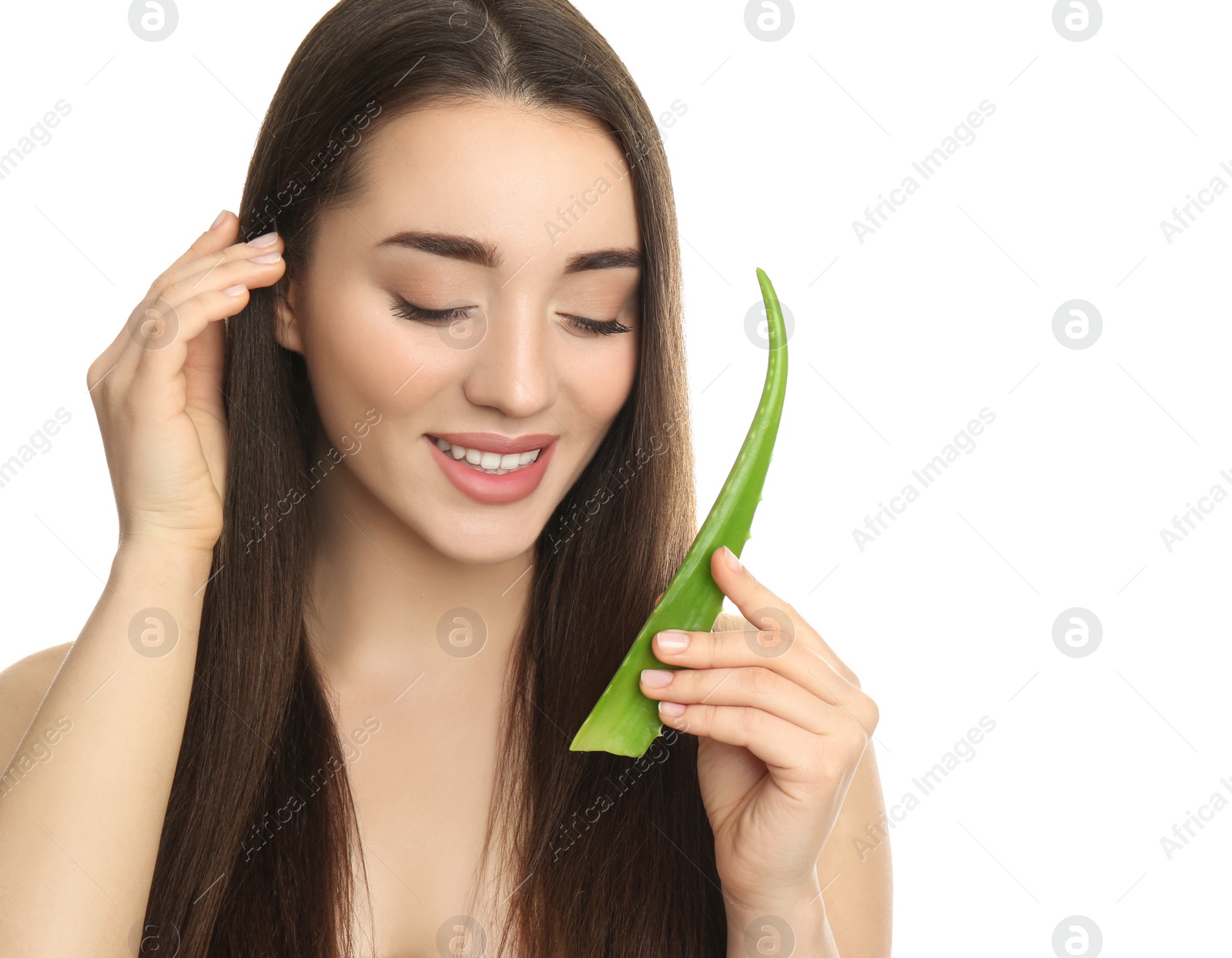 Photo of Young woman with aloe vera leaf on white background