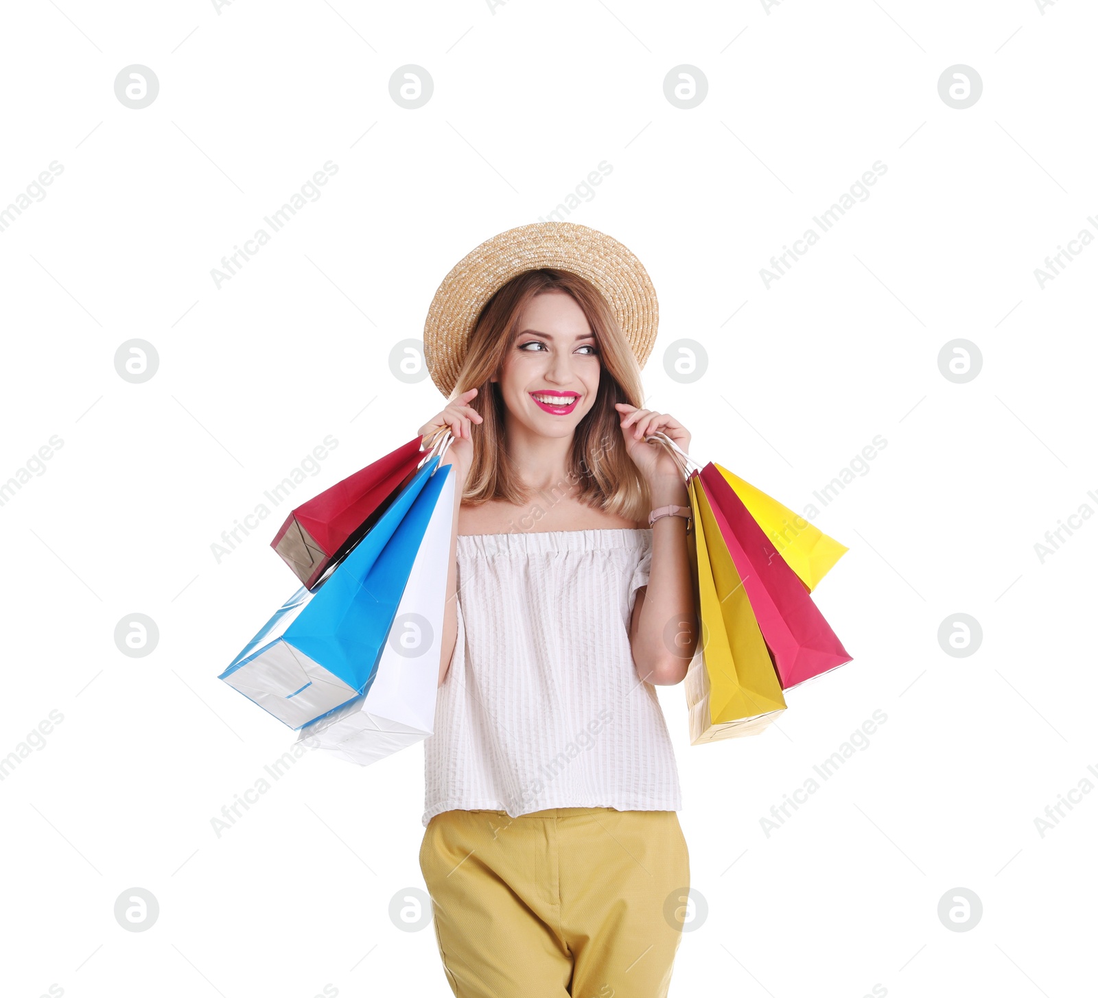 Photo of Beautiful young woman with shopping bags on white background