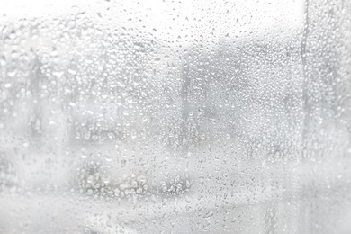 Image of Closeup view of window with rain drops