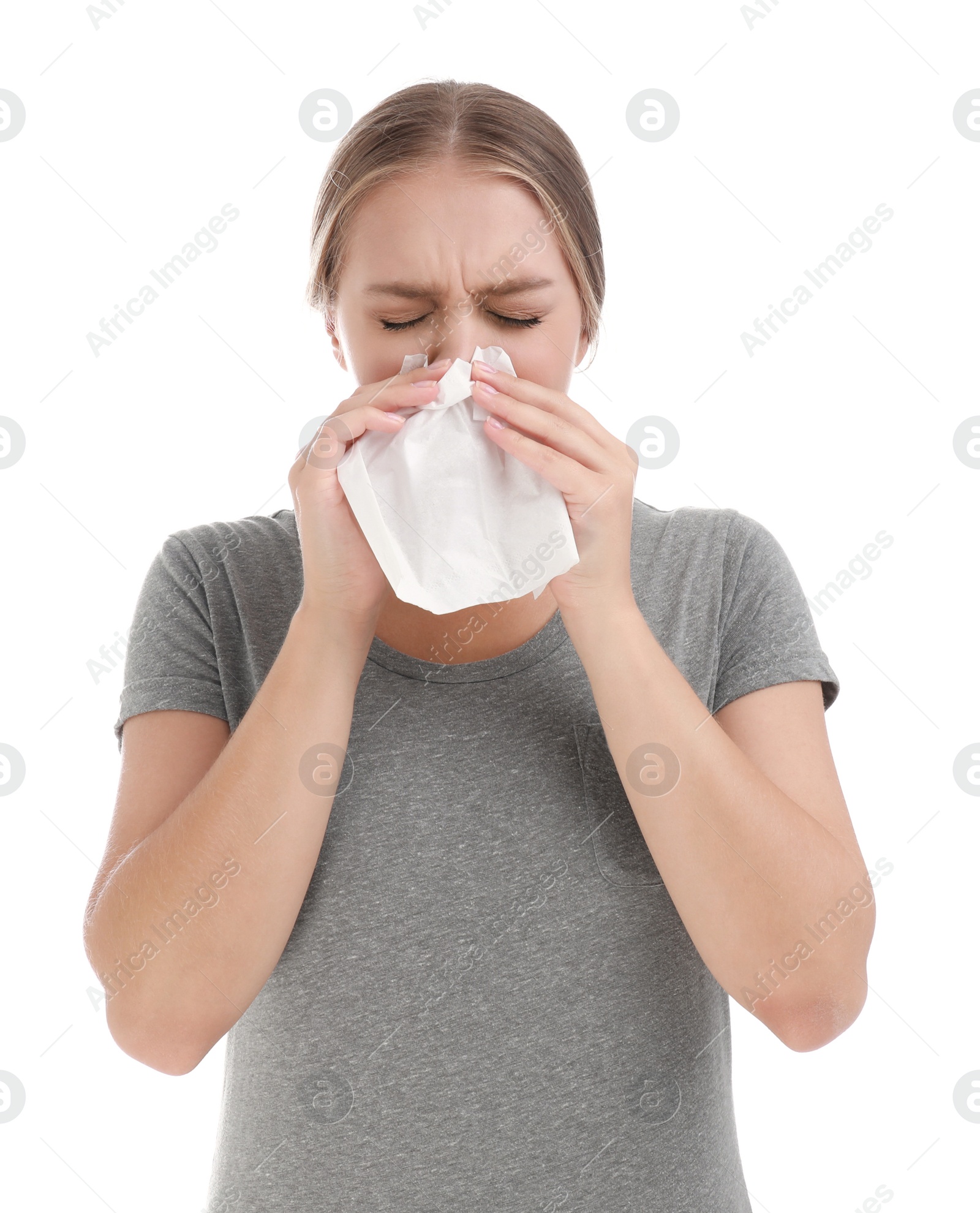 Photo of Young woman suffering from allergy on white background