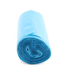 Photo of Roll of light blue garbage bags isolated on white