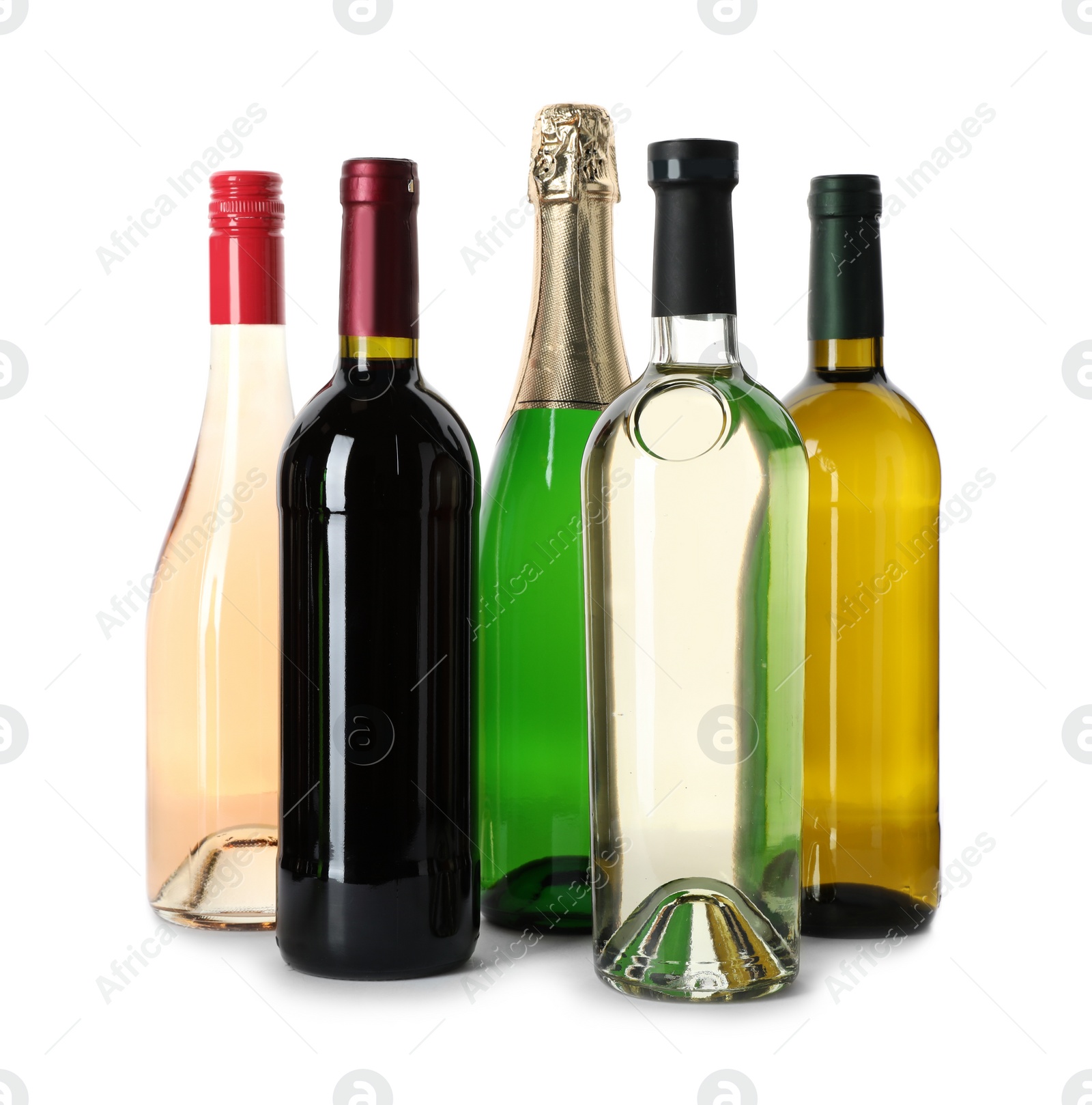 Photo of Bottles with different alcoholic drinks on white background