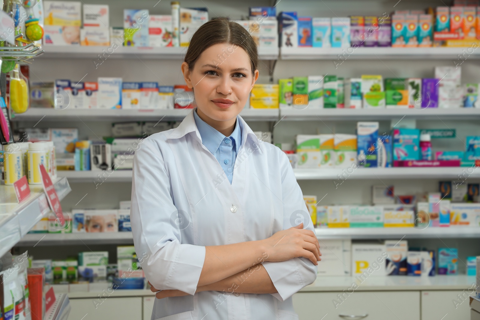 Photo of Portrait of professional pharmacist in modern drugstore