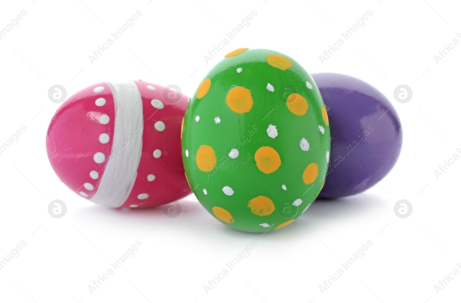 Photo of Decorated Easter eggs on white background. Festive tradition