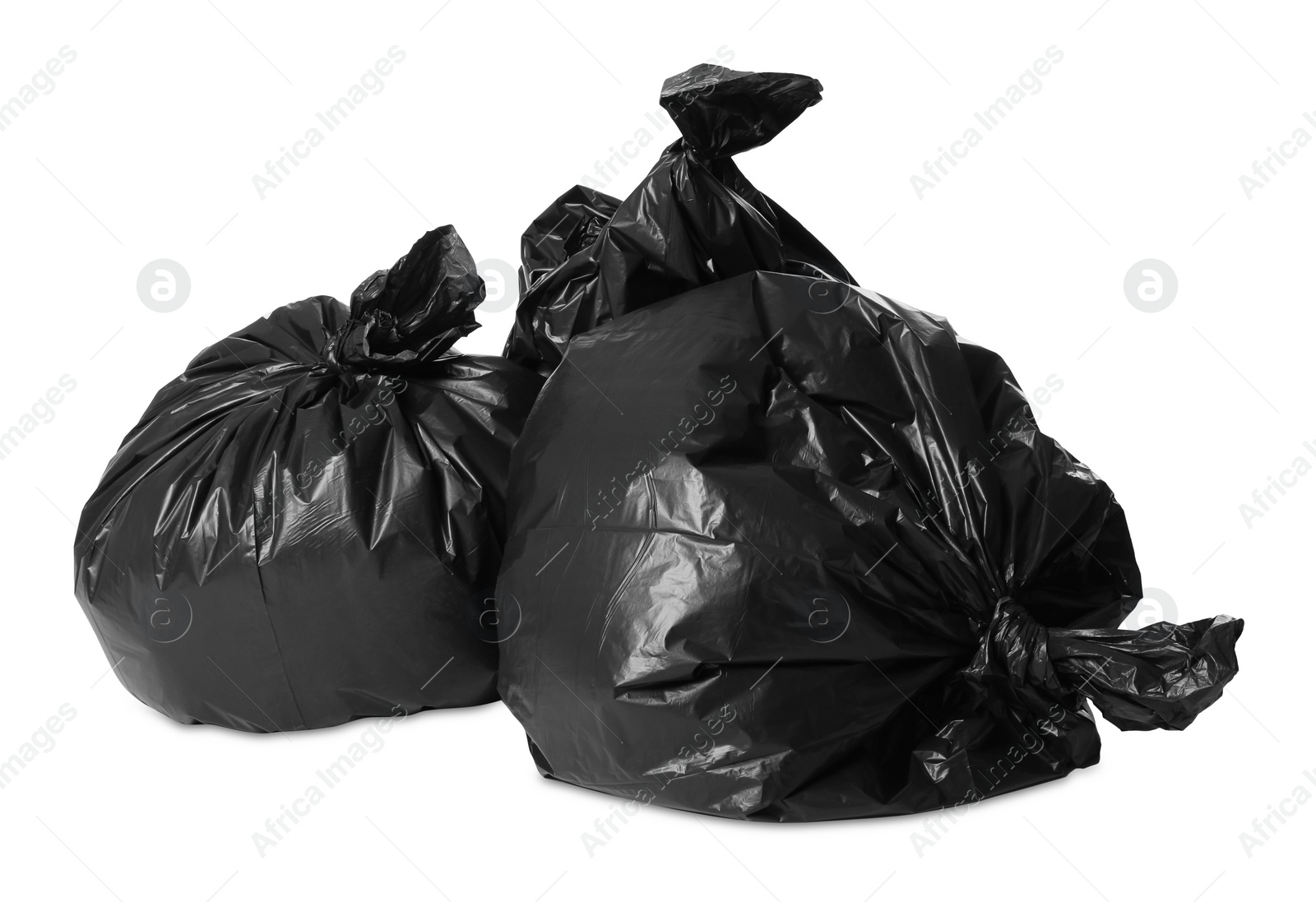 Photo of Trash bags full of garbage isolated on white