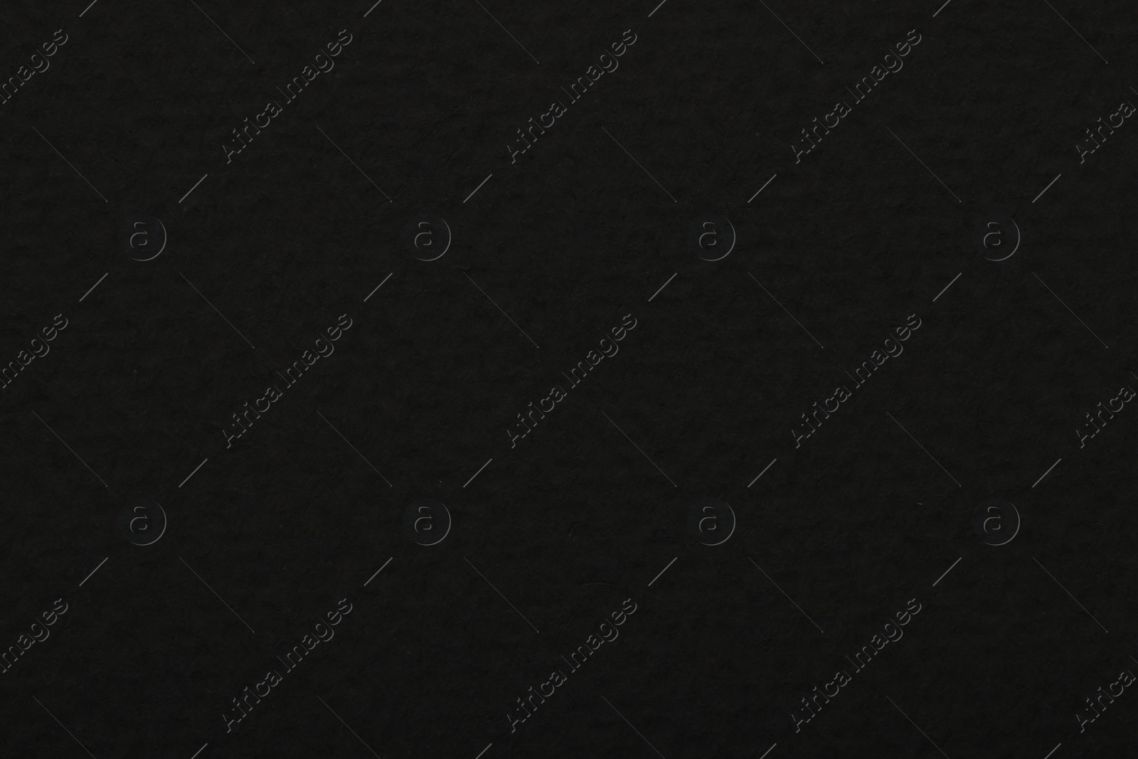 Photo of Texture of black paper sheet as background, top view