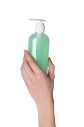 Photo of Woman holding bottle of face cleansing product on white background, closeup