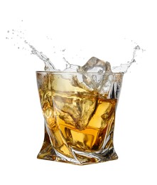Photo of Whiskey splashing out of glass on white background
