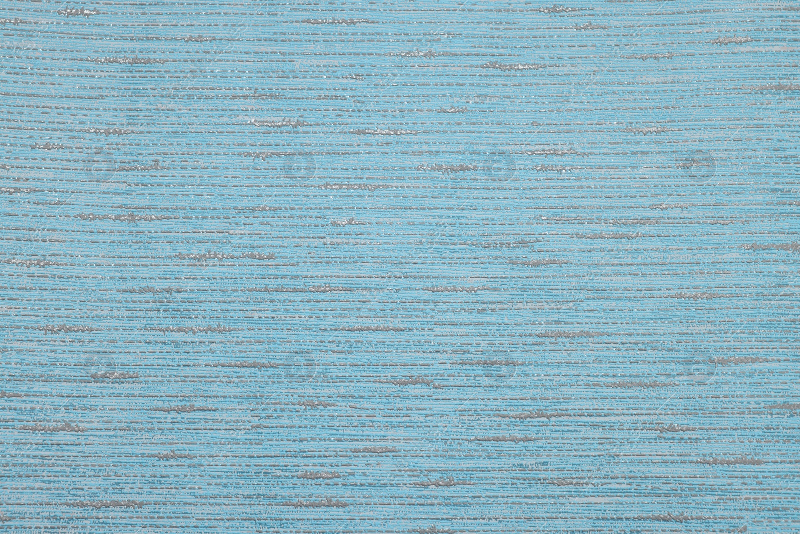 Photo of Stylish light blue wallpaper as background, closeup view