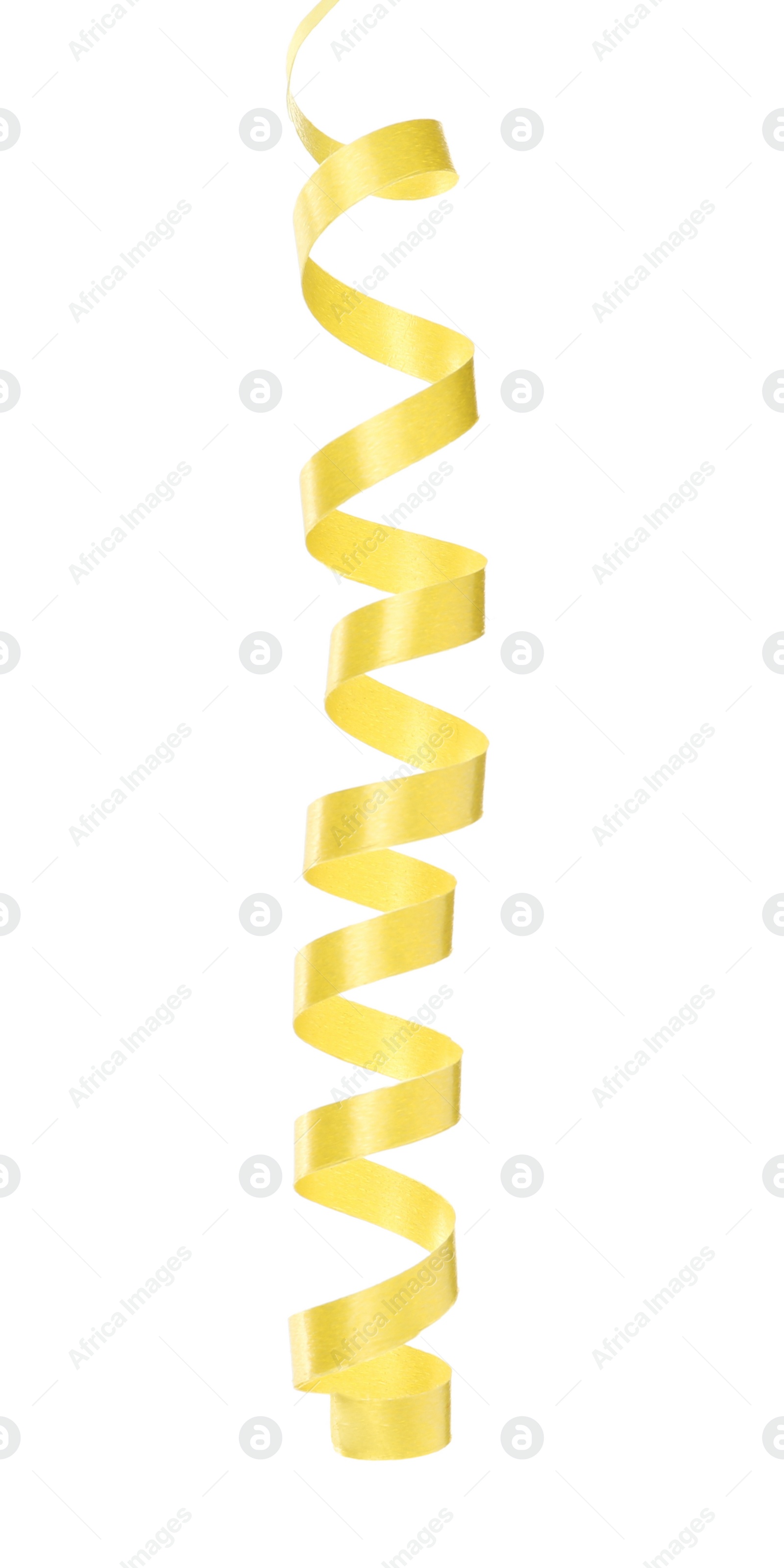 Photo of Shiny yellow serpentine streamer on white background