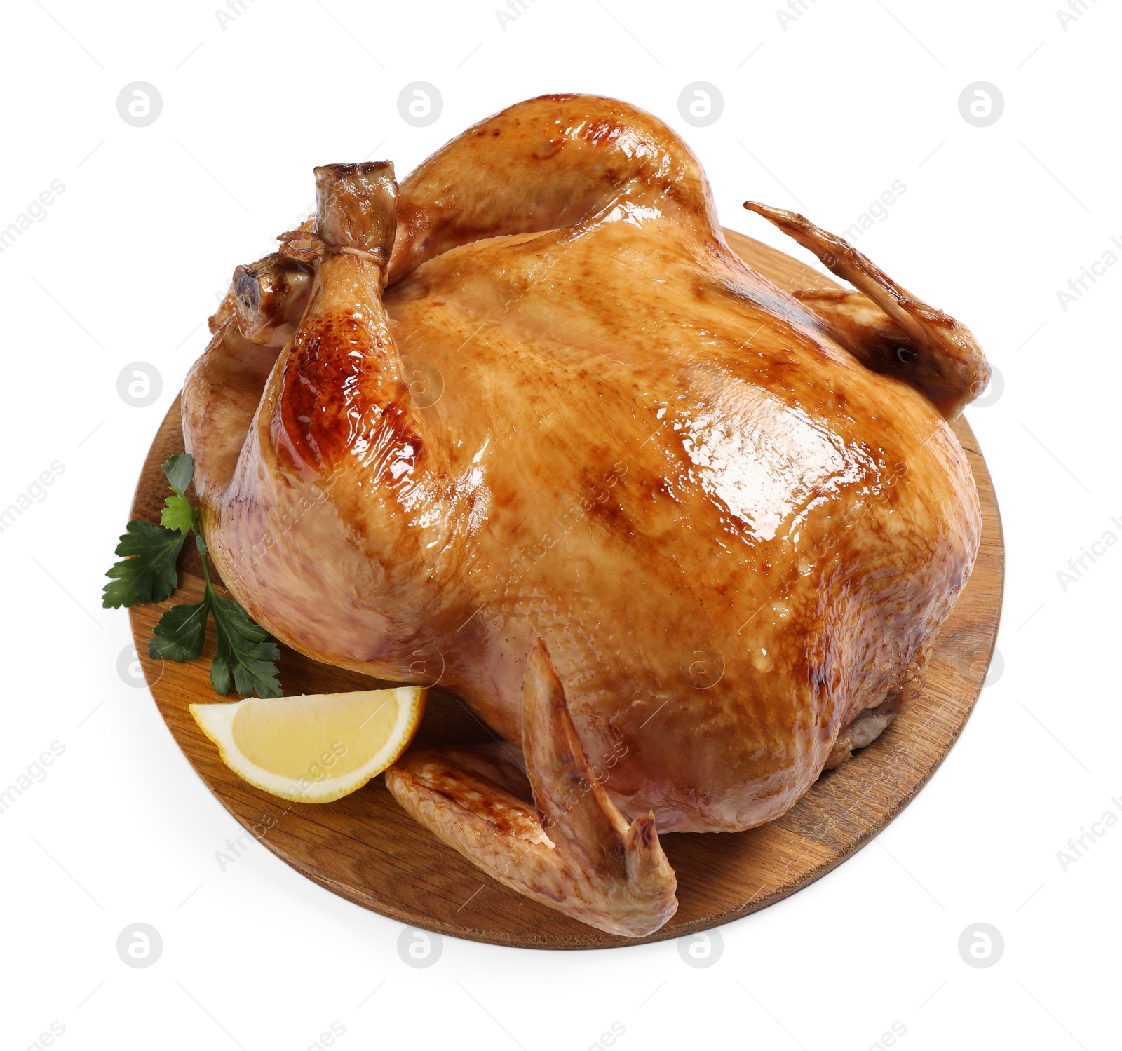 Photo of Tasty roasted chicken with parsley and lemon isolated on white