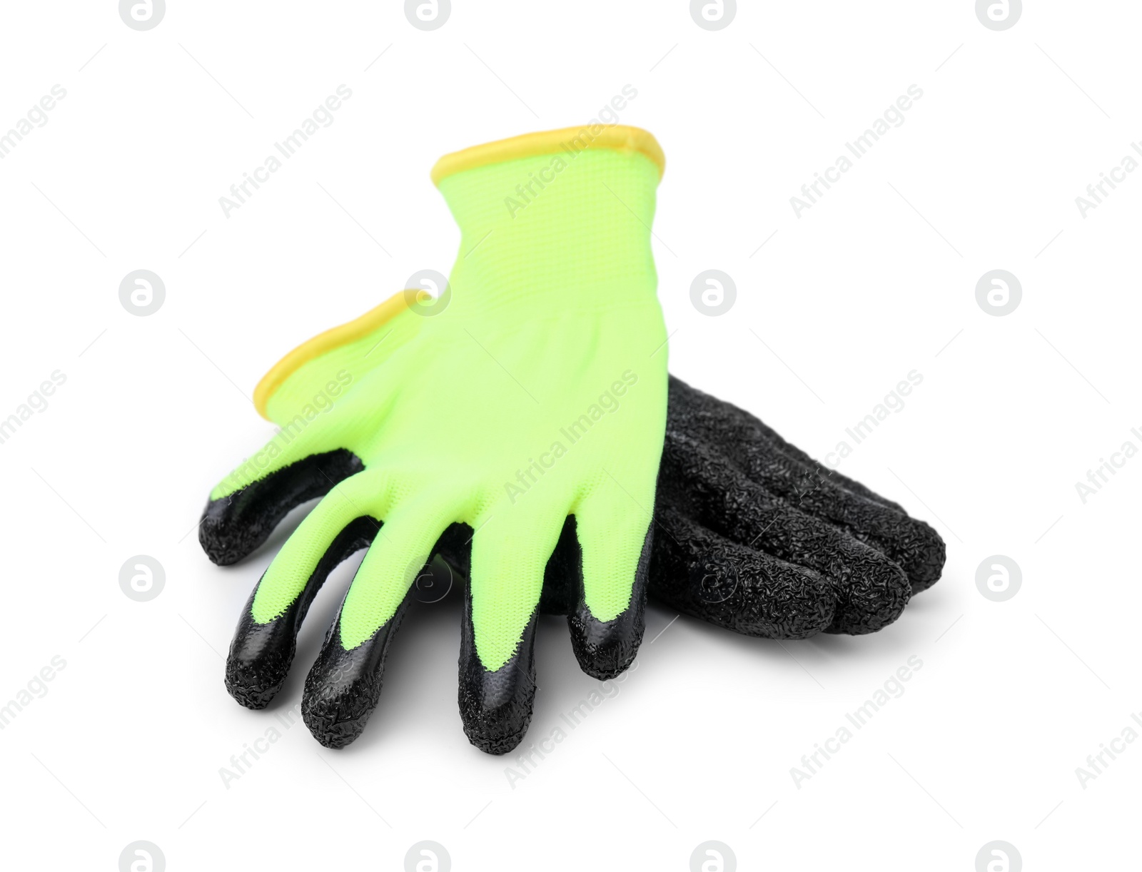 Photo of Pair of color gardening gloves isolated on white