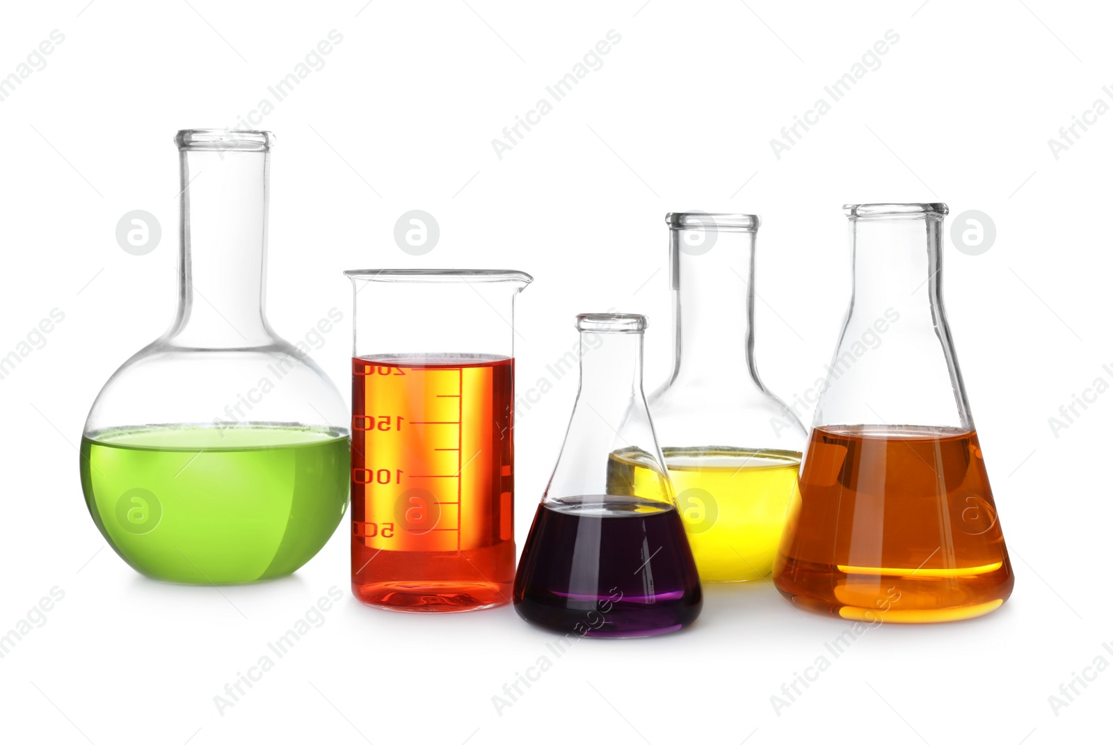 Photo of Laboratory glassware with color liquids on white background