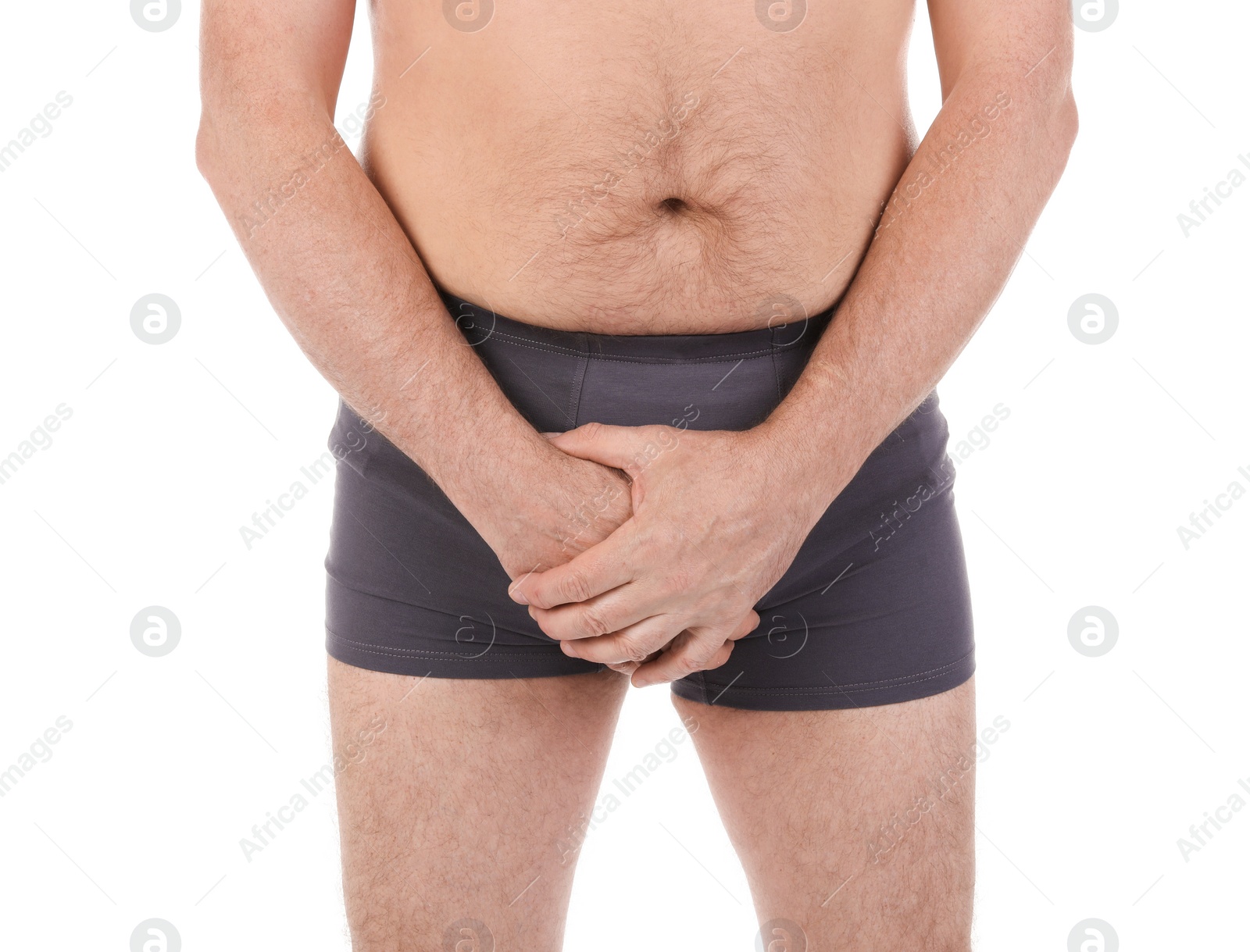 Photo of Mature man with urological problems suffering from pain on white background