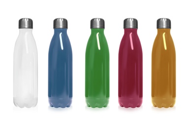 Image of Set of modern thermos bottles in different colors on white background 