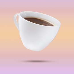 Image of White cup of coffee levitating on color background