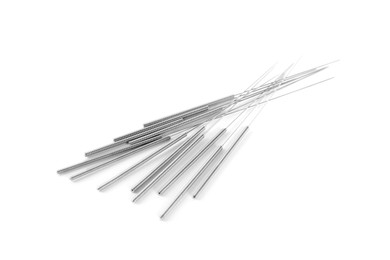 Photo of Many needles for acupuncture on white background