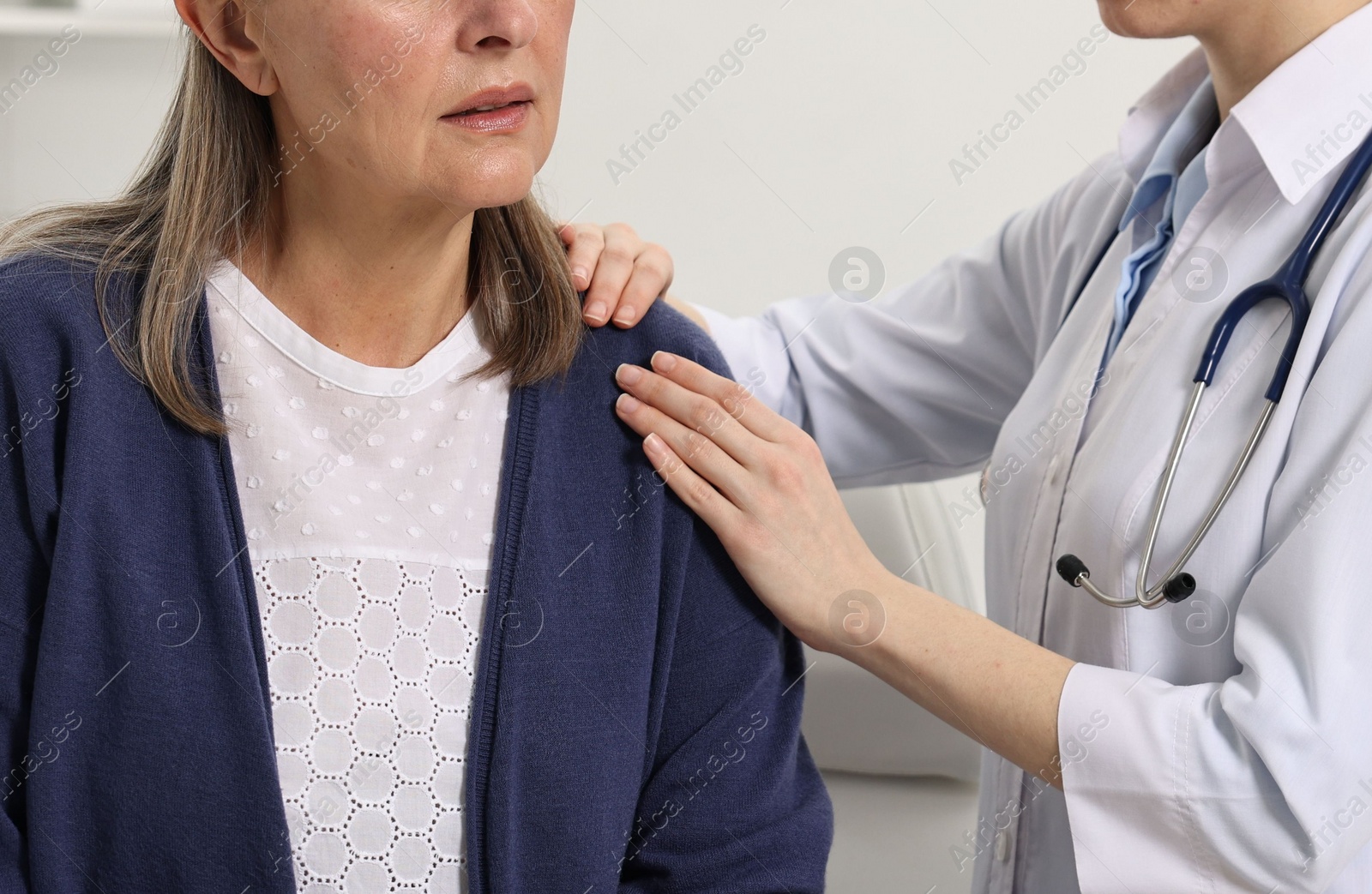 Photo of Arthritis symptoms. Doctor examining patient with shoulder pain in hospital